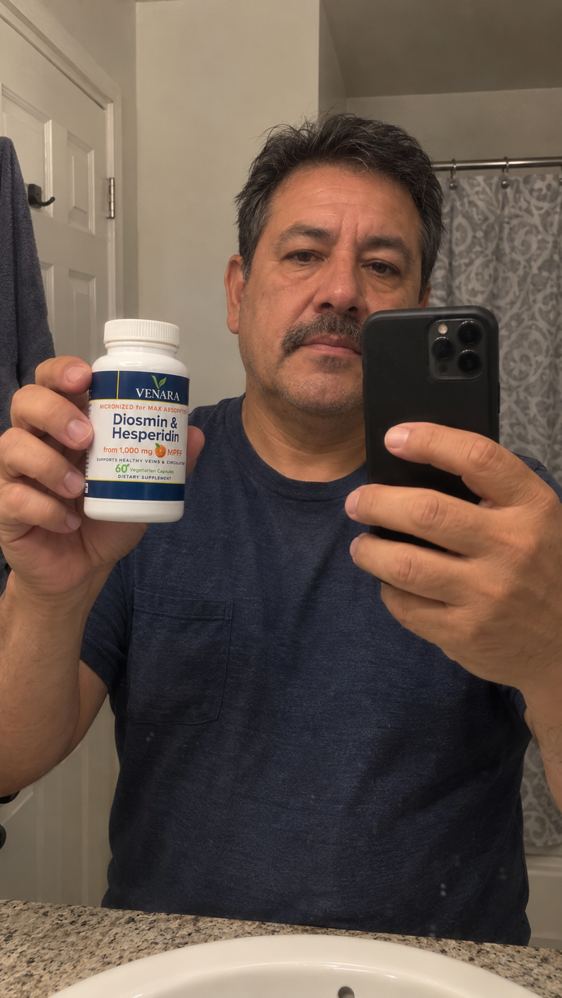 Person holding a bottle of Venara Diosmin & Hesperidin